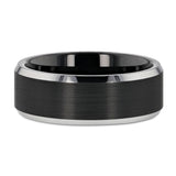 Tungsten men's wedding ring with brushed black center and metallic beveled edges.