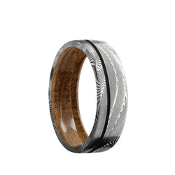 Tightweave Damascus flat men's wedding band with a 0.5mm off-center black cerakote inlay featuring a whiskey barrel wood sleeve