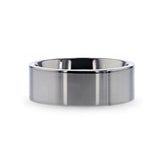 Titanium flat wedding ring with polished finish.