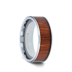 Tungsten Carbide flat wedding ring with rare koa wood inlay and polished edges.