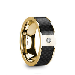 14K Gold men's wedding band with black carbon fiber inlay, flat edges and a solitaire diamond setting