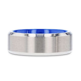Titanium wedding ring with blue interior, brushed center, and beveled edges. 