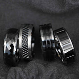 Tungsten men's wedding ring with grooved, black, ceramic center and beveled edges.