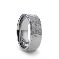 Titanium wedding ring with raised hammered center and polished step edges. 