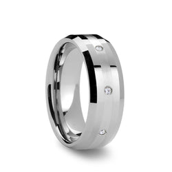Tungsten Carbide men's wedding ring with platinum inlay set with diamonds and beveled edges.
