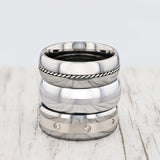 Beveled Tungsten Carbide ring with platinum inlay set with diamonds