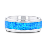 Tungsten men's wedding band with blue green opal inlay and beveled edges