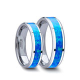 Tungsten matching wedding bands with beveled edges and blue green opal inlay