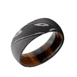 Damascus Steel domed men's wedding band in an acid wash featuring a...